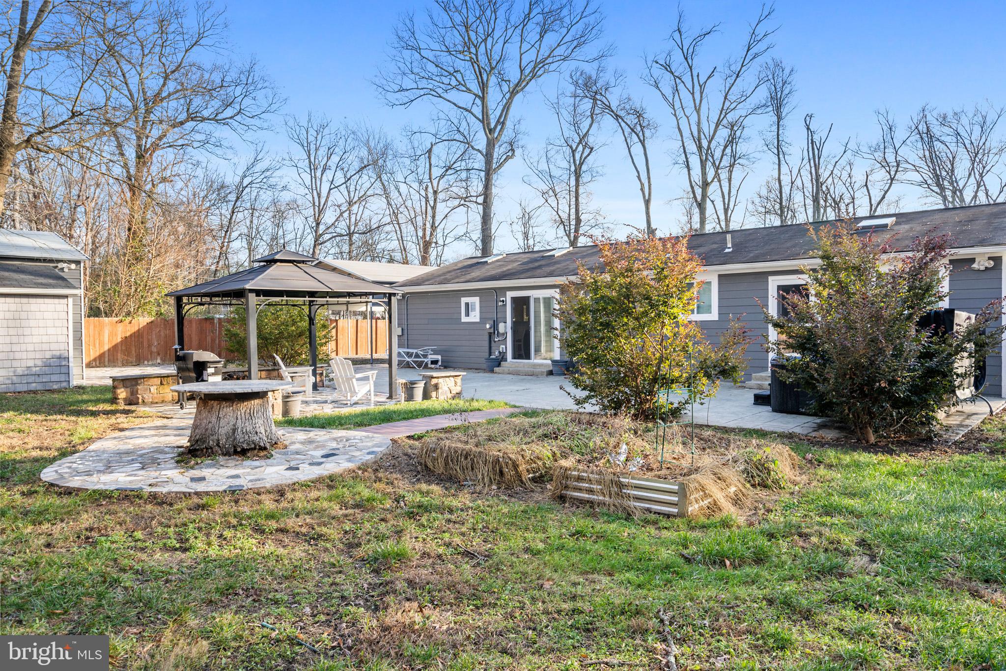 317 Biddle Road Accokeek, MD 20607 - Photo 36 of 44 a front view of a house with garden