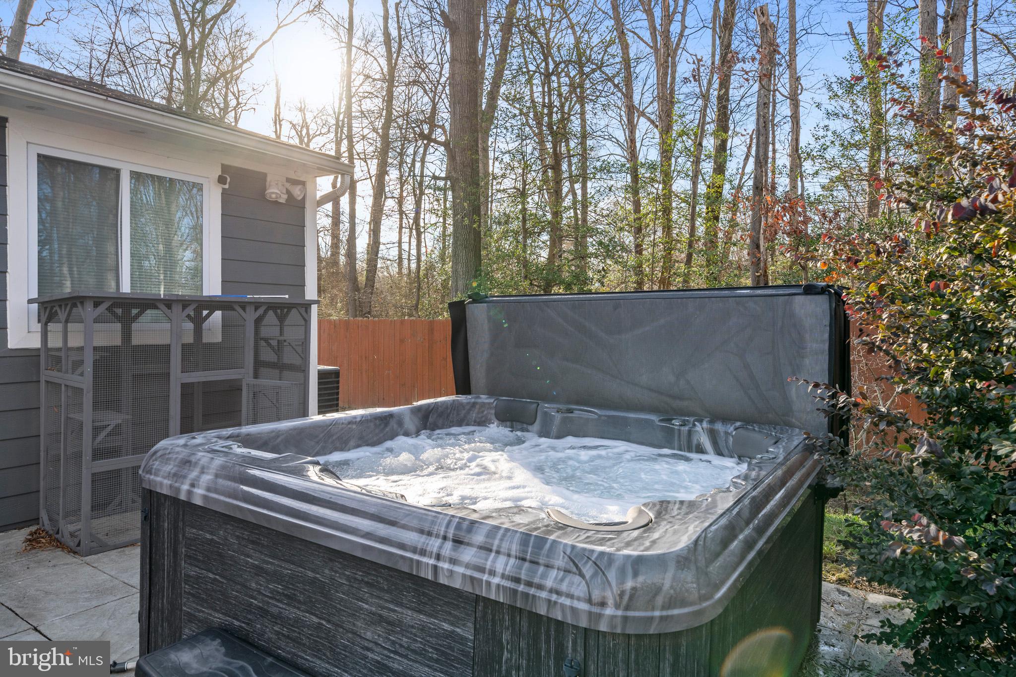 317 Biddle Road Accokeek, MD 20607 - Photo 37 of 44 a wooden talbe sitting in front of a house