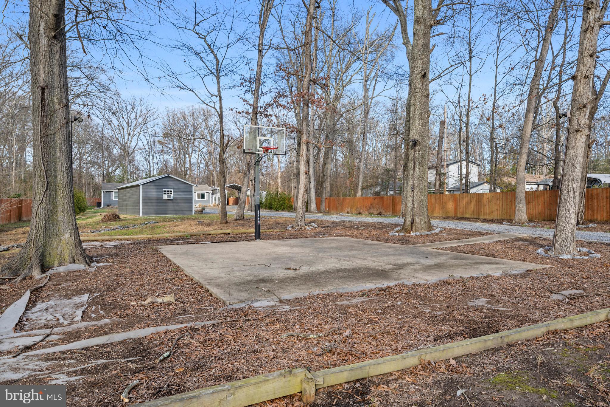 317 Biddle Road Accokeek, MD 20607 - Photo 42 of 44 a road view with large trees