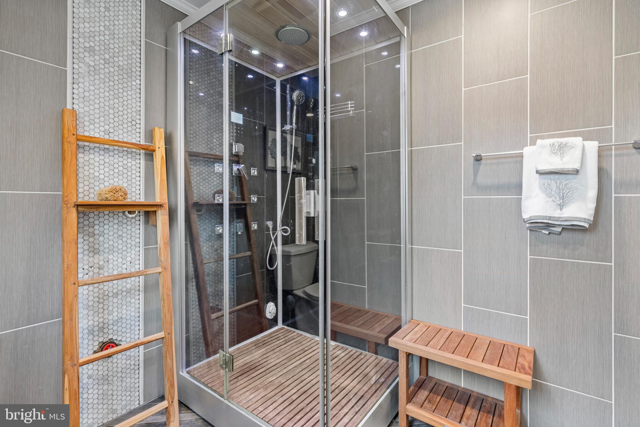 317 Biddle Road Accokeek, MD 20607 - Photo 5 of 44 a bathroom with a shower