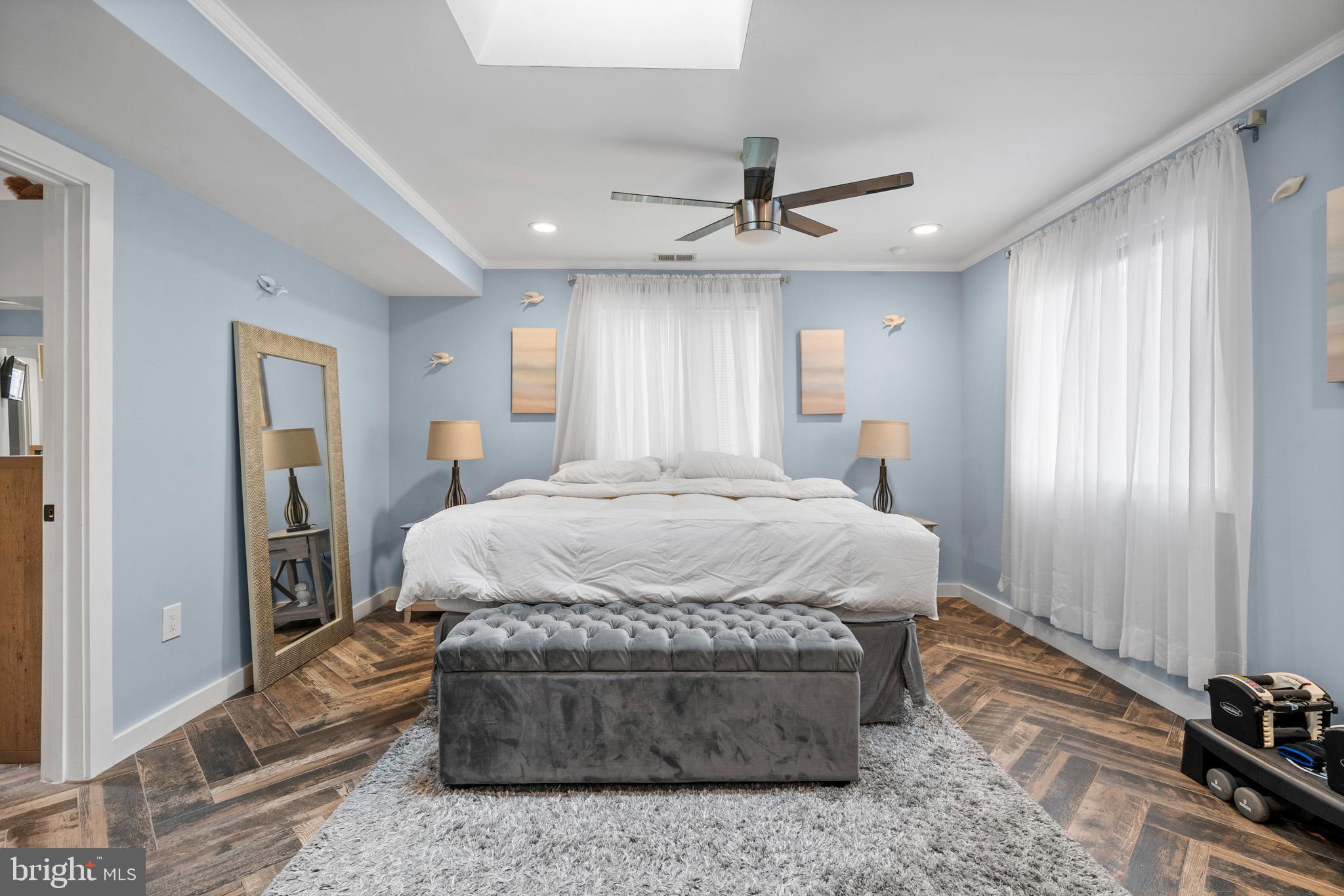 317 Biddle Road Accokeek, MD 20607 - Photo 9 of 44 a bed sitting in a spacious bedroom next to a window