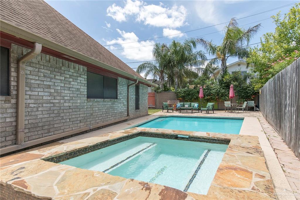 2801 Hawk Avenue McAllen, TX 78504 - Photo 14 of 19 a view of a swimming pool with a patio