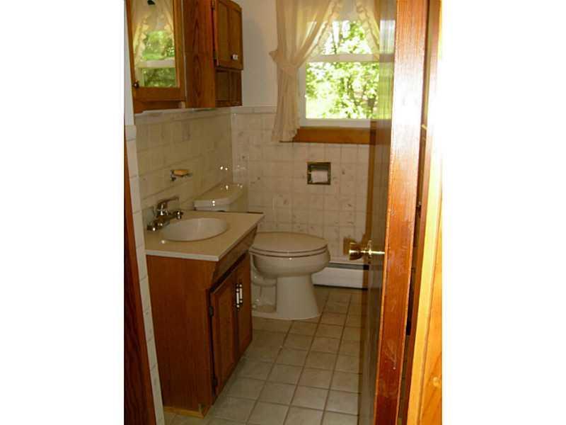 443 Gorham Road Scarborough, ME 04074 - Photo 18 of 21 Bathroom. Tile full bath with linen...