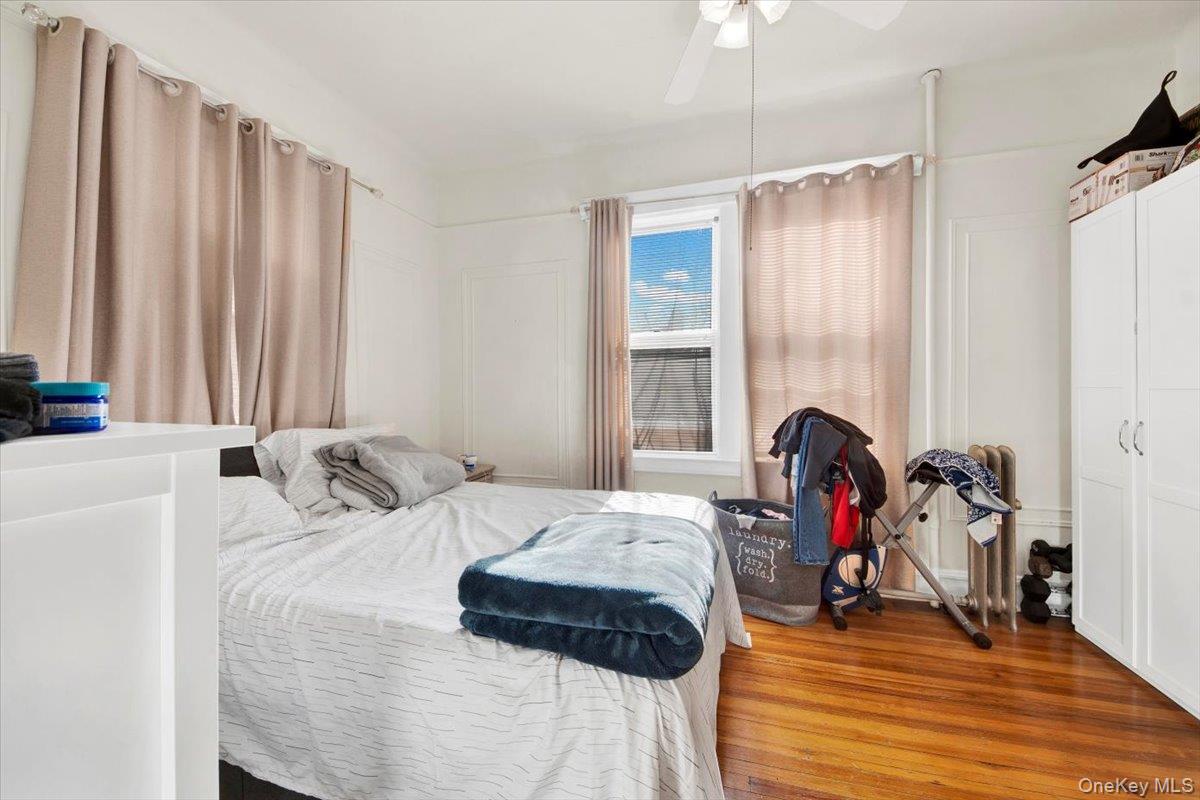 2312 Morgan Avenue Bronx, NY 10469 - Photo 11 of 36 Bedroom featuring hardwood / wood-style floors and ceiling fan