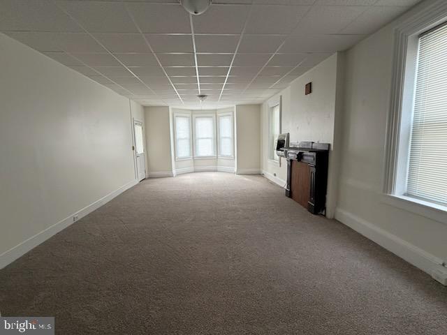 202 Maple Street, Unit 3 Gordonville, PA 17529 - Photo 2 of 9 an empty room with windows