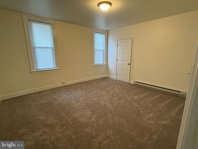 202 Maple Street, Unit 3 Gordonville, PA 17529 - Photo 7 of 9 an empty room with windows