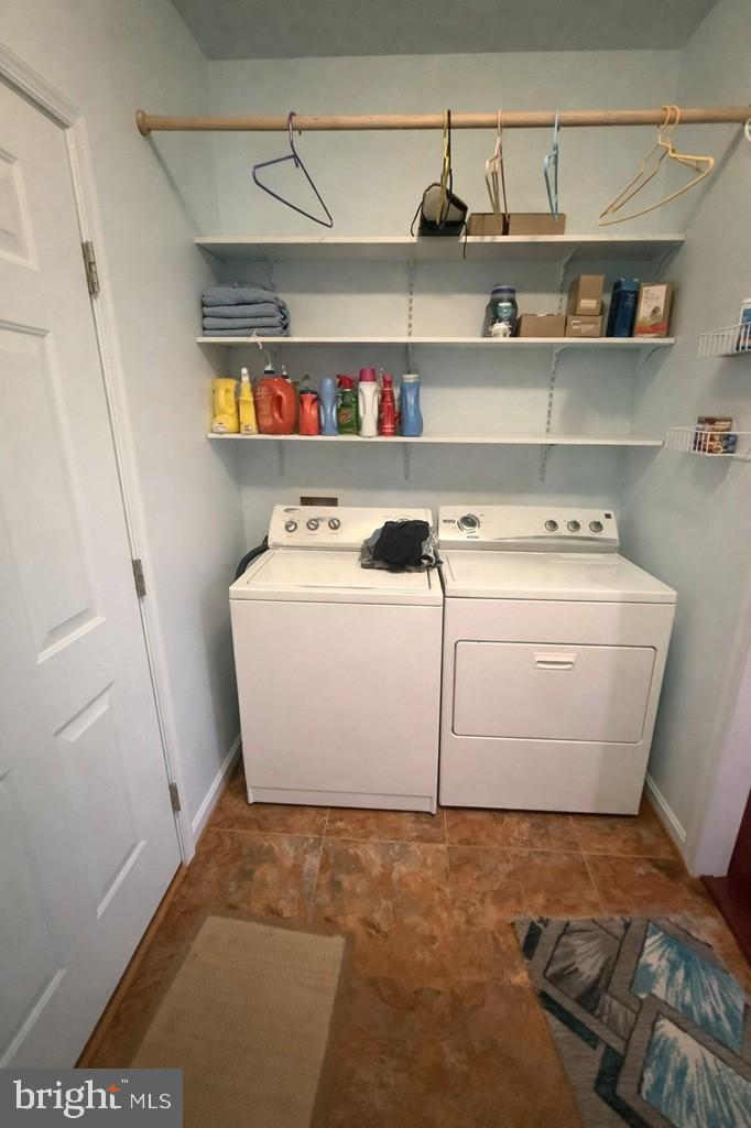 14137 Cedar Run Road Culpeper, VA 22701 - Photo 21 of 30 a utility room with dryer and washer