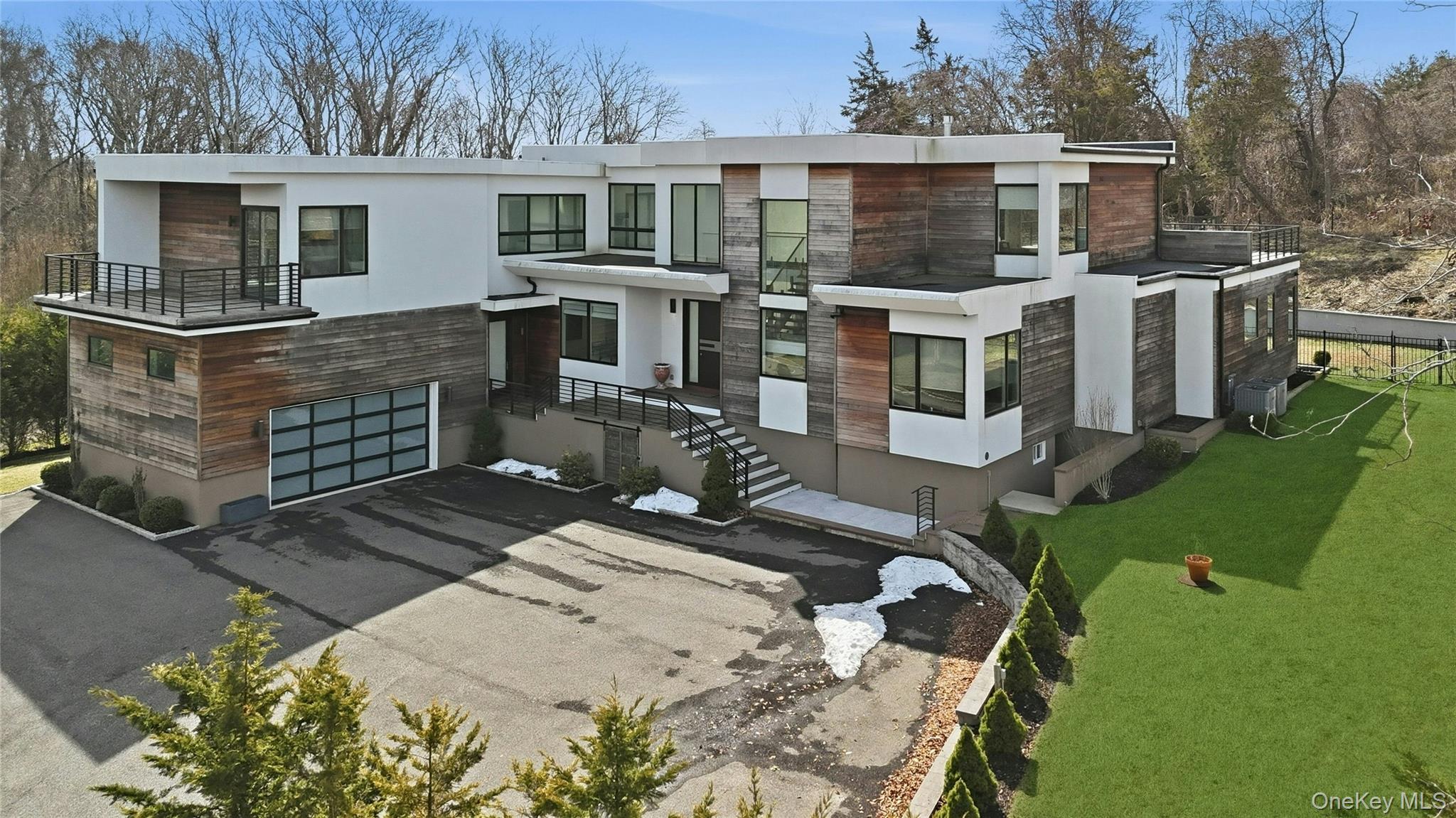 a view of a house with backyard porch and sitting area