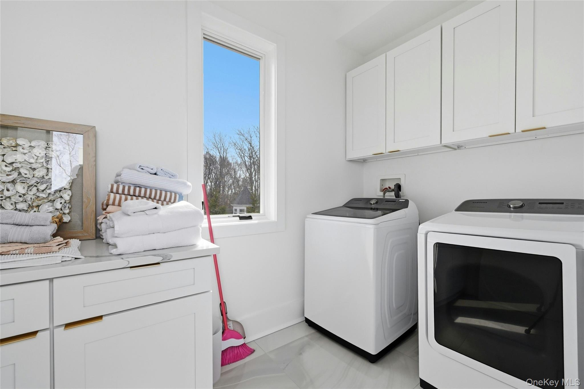 43 Smugglers Path Riverhead, NY 11901 - Photo 23 of 37 a utility room with dryer and washer