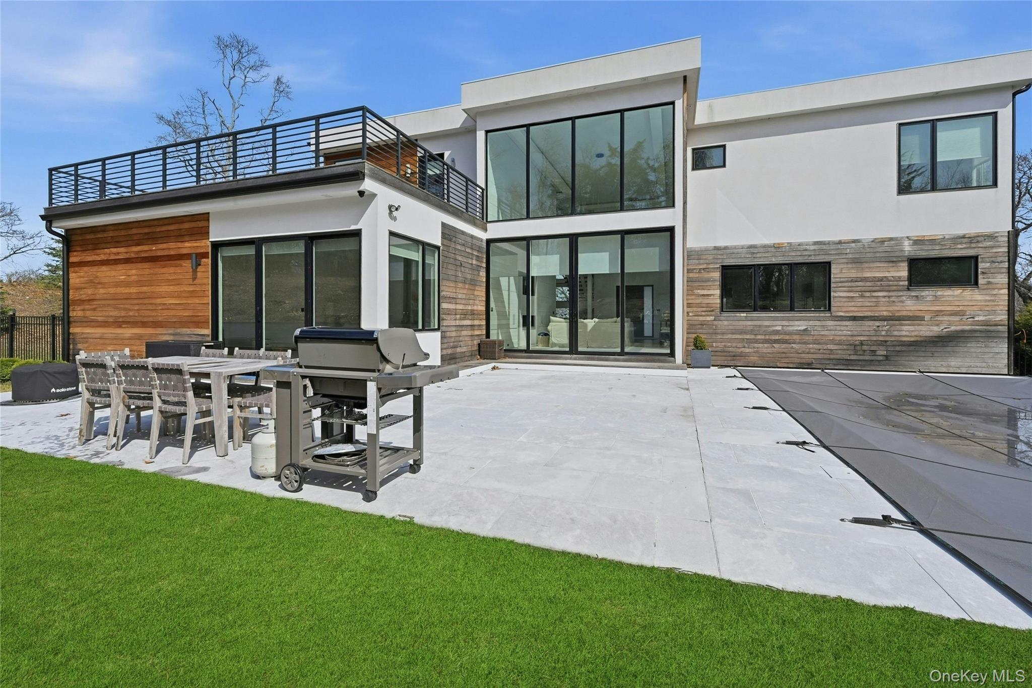 43 Smugglers Path Riverhead, NY 11901 - Photo 26 of 37 a view of a house with patio