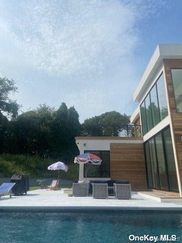 43 Smugglers Path Riverhead, NY 11901 - Photo 31 of 37 a view of house with outdoor space