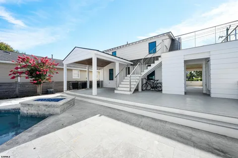 a view of a house with a street