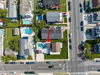 front view of a house with a street