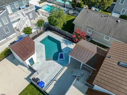 an aerial view of house with balcony