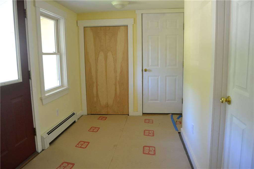 401 Dublin Road Owls Head, ME 04854 - Photo 2 of 20 Entering breezeway. Closet. Door to...