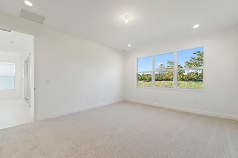 an empty room with window