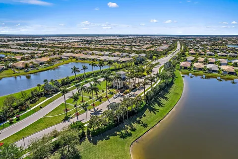 an aerial view of a house with a swimming pool