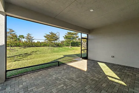 a view of house with backyard