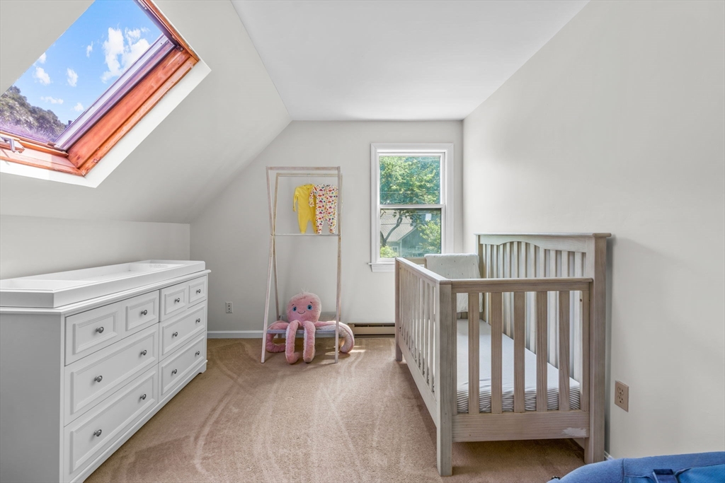 125 St Marks Road Falmouth, MA 02536 - Photo 23 of 31 a bedroom with furniture and a window