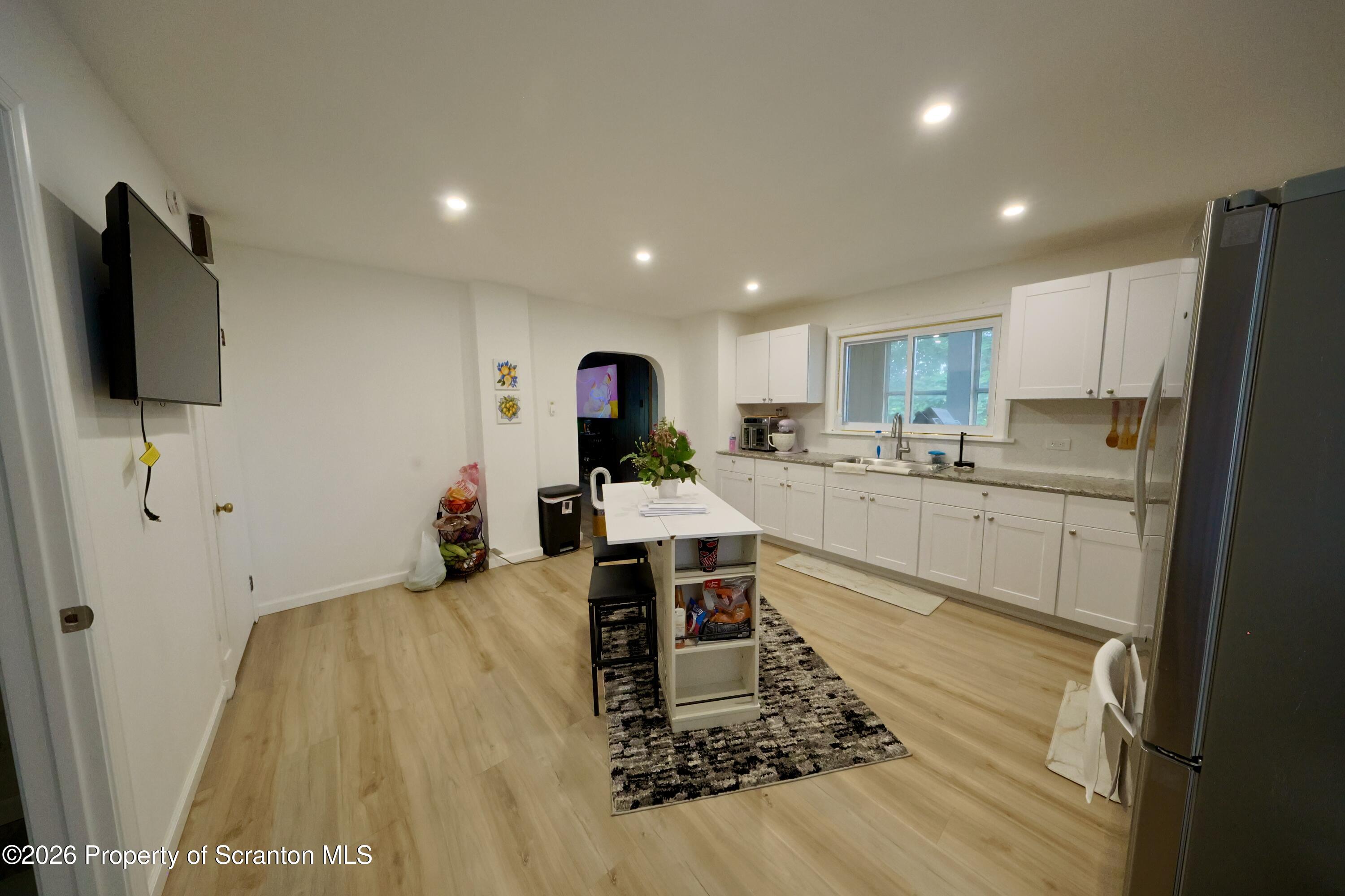 827 Main Street Sugar Notch, PA 18706 - Photo 5 of 25 a kitchen with stainless steel appliances granite countertop a refrigerator sink and microwave