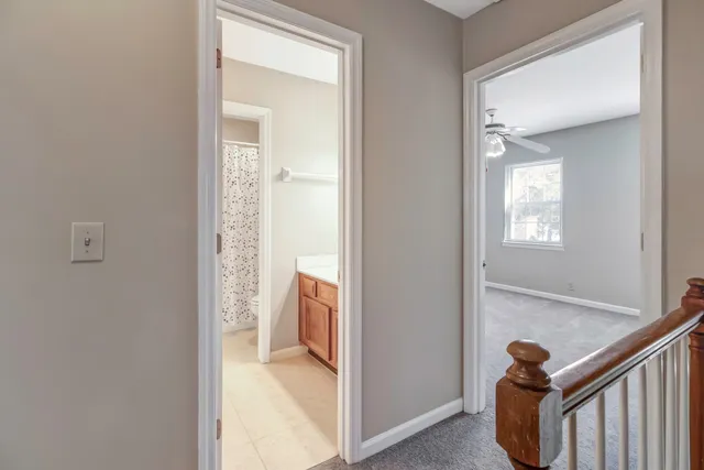a view of a hallway and interior of a house