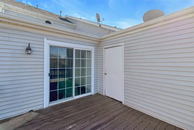a view of a house with a snow in front of it