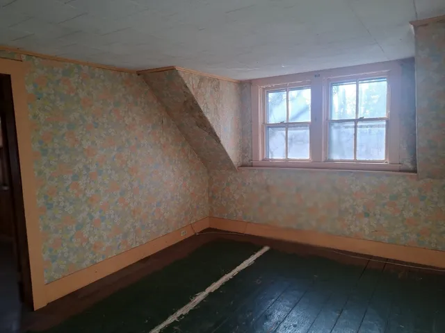 an empty room with a window