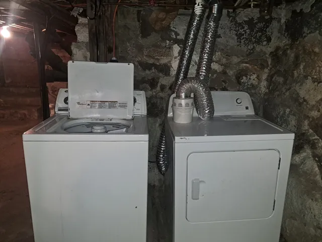 a storage room with washer and dryer