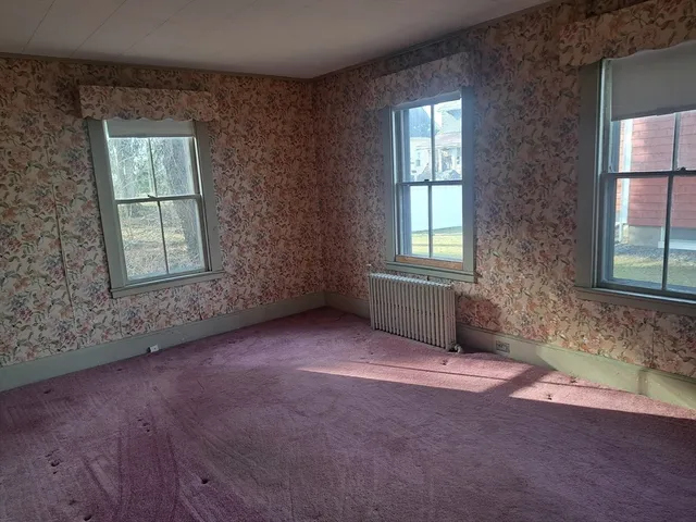 an empty room with a window