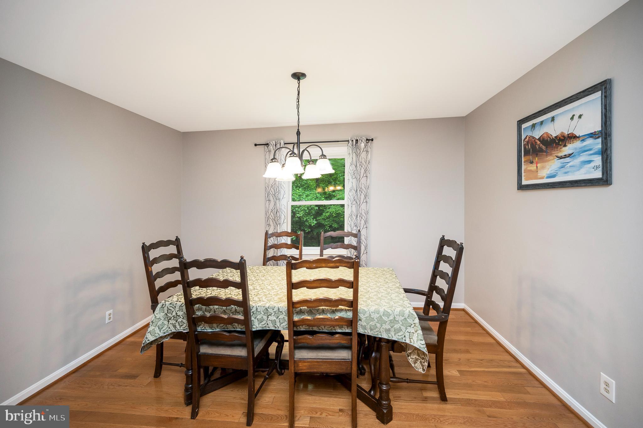 679 Cropp Road Fredericksburg, VA 22406 - Photo 11 of 39 a view of a dining room with furniture window and outside view