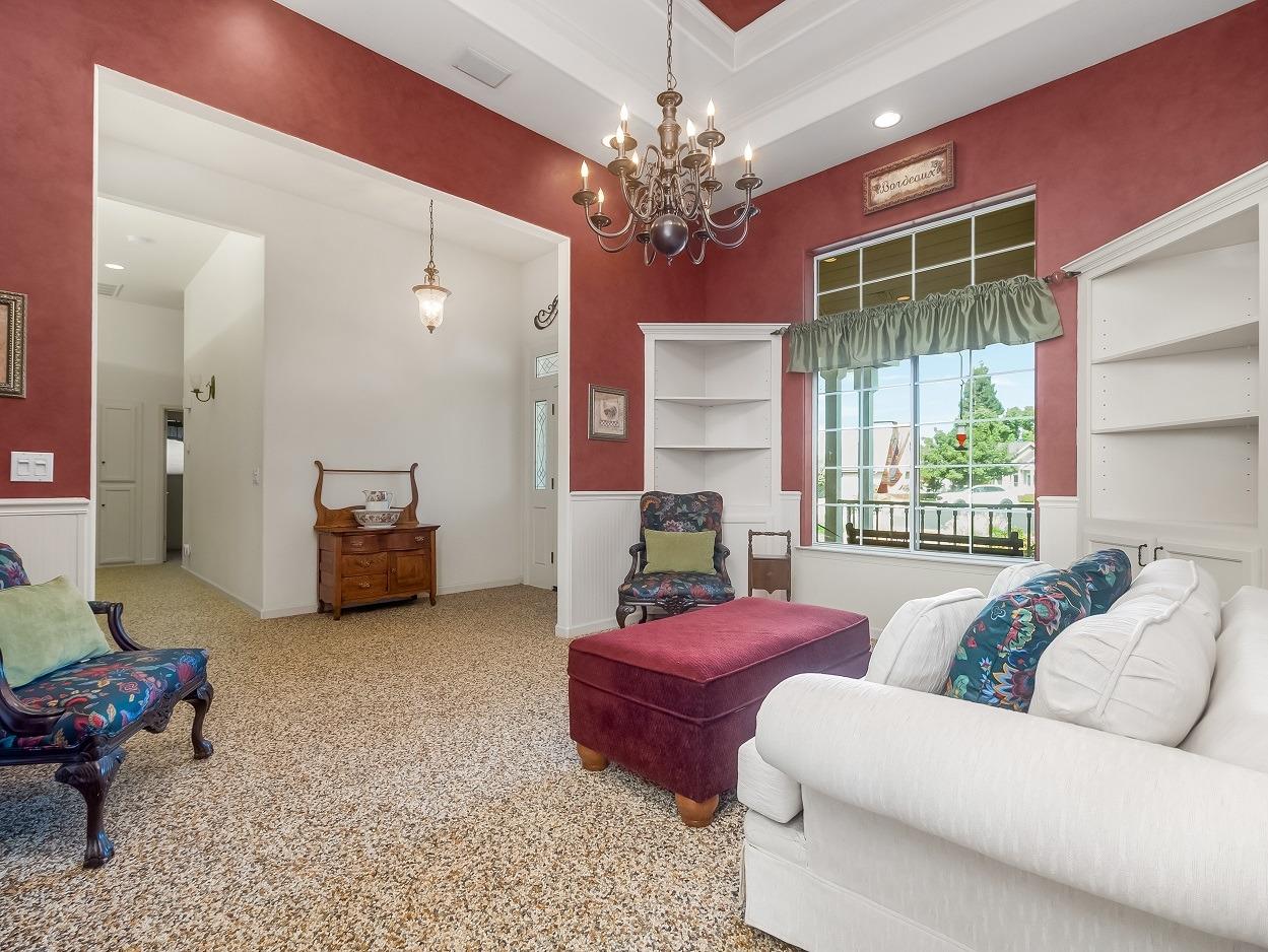 602 Fallbrook Avenue Clovis, CA 93611 - Photo 19 of 51 a living room with furniture and a large window