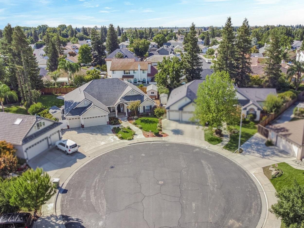 602 Fallbrook Avenue Clovis, CA 93611 - Photo 2 of 51 an aerial view of a house with a garden