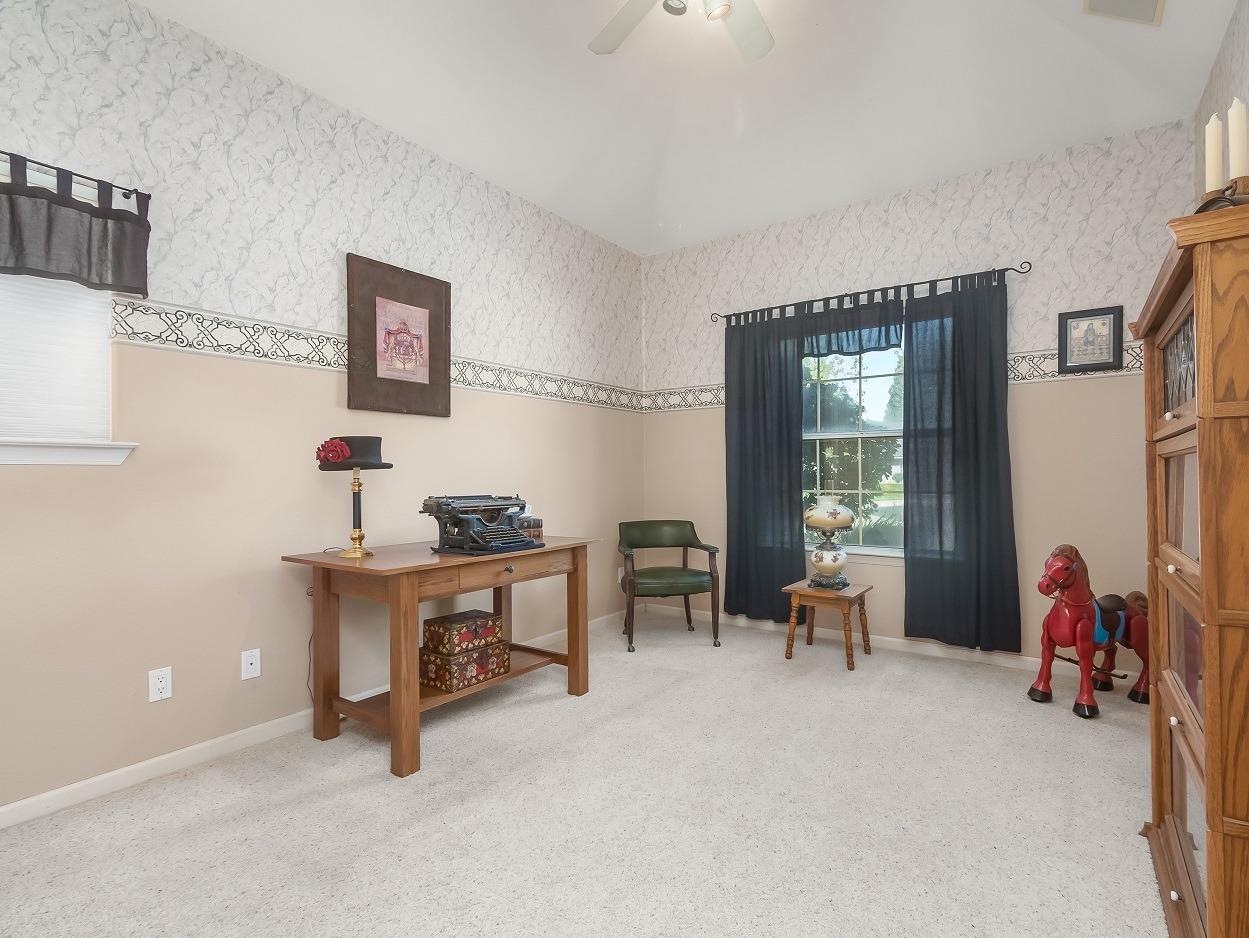 602 Fallbrook Avenue Clovis, CA 93611 - Photo 33 of 51 a view of a workspace with furniture and a window