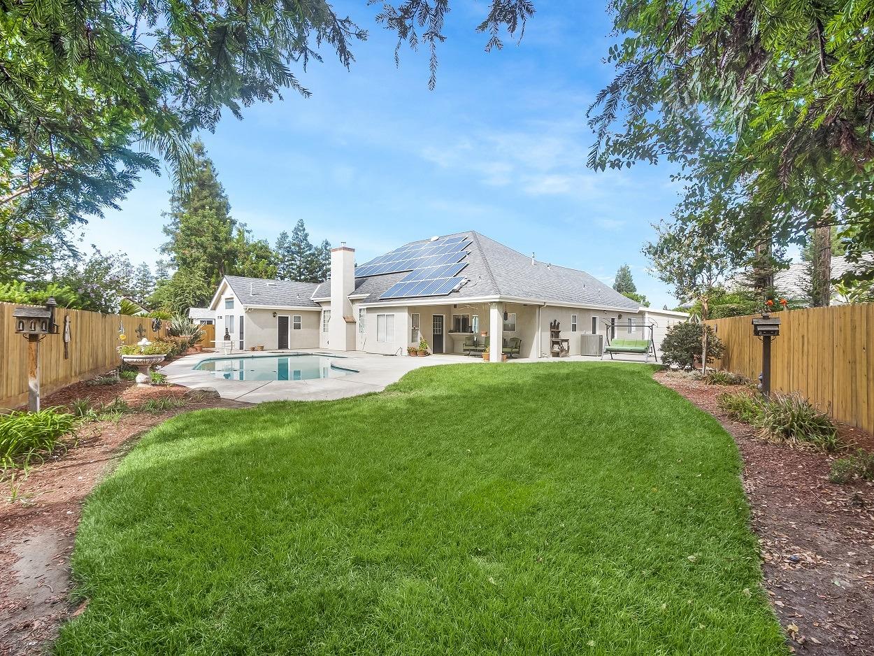602 Fallbrook Avenue Clovis, CA 93611 - Photo 40 of 51 a front view of a house with a yard