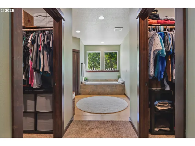 a view of a livingroom with furniture and closet