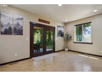 a view of an empty room with a window