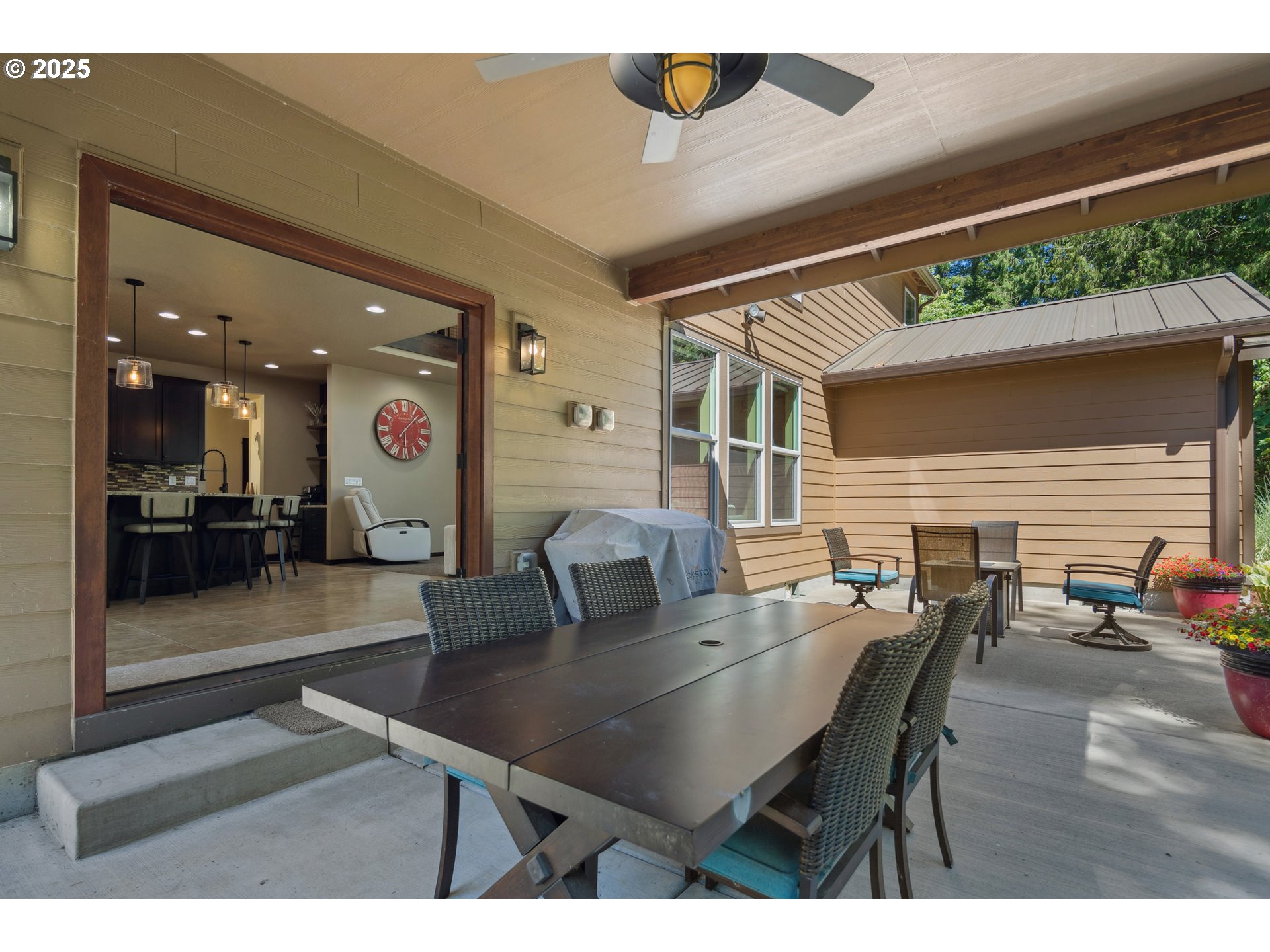 57214 East Marmot Road Sandy, OR 97055 - Photo 34 of 48 a view of a dining room with furniture and wooden floor