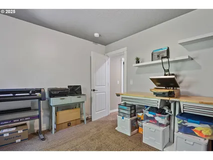 a kitchen with furniture and a stove top oven