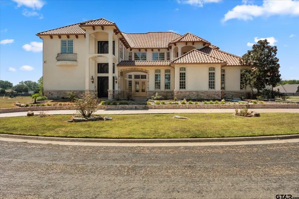 a view of houses with yard