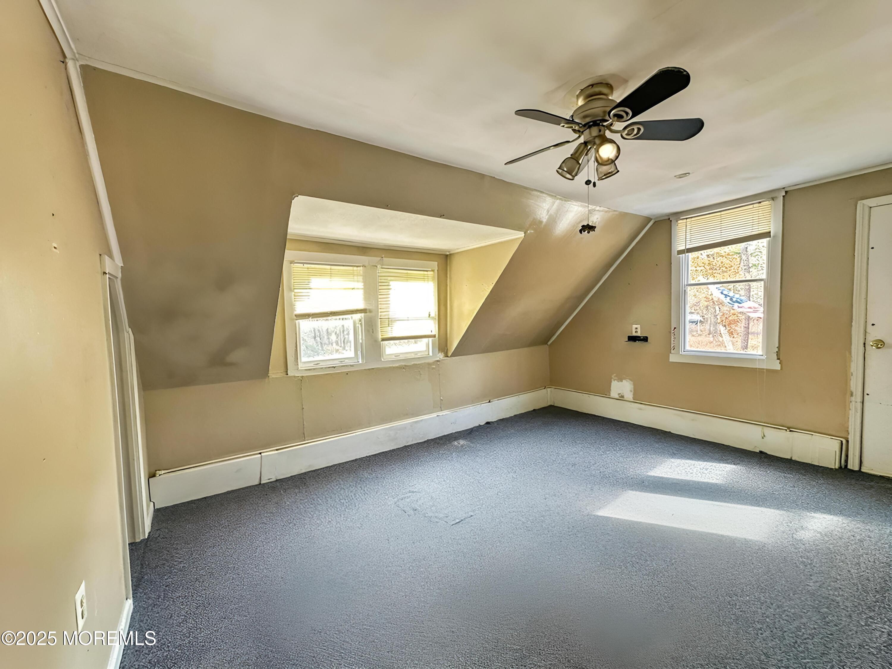 5 Pittenger Pond Road Freehold, NJ 07728 - Photo 15 of 20 a view of an empty room with a window
