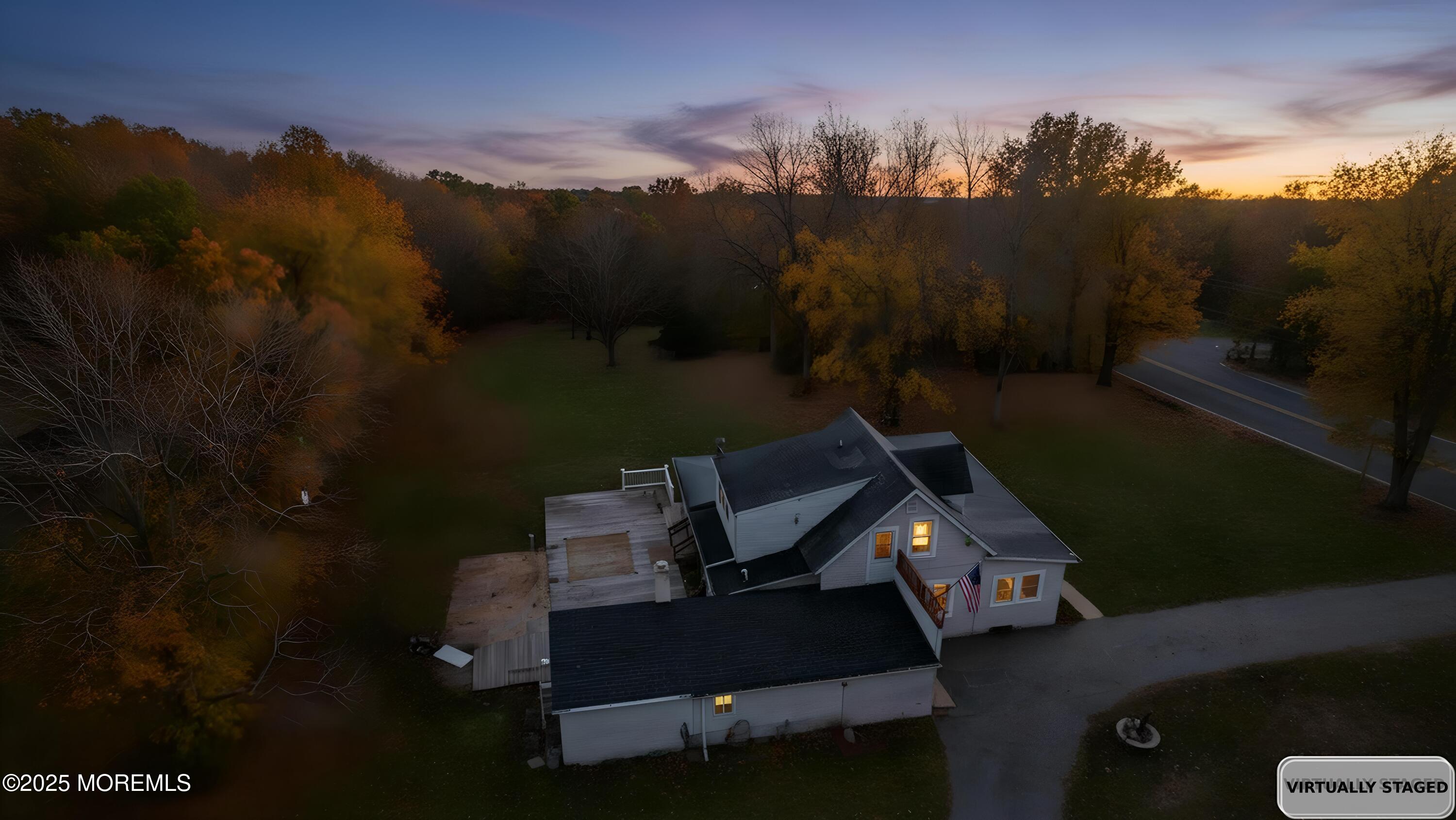 5 Pittenger Pond Road Freehold, NJ 07728 - Photo 19 of 20 a view of a terrace with a yard