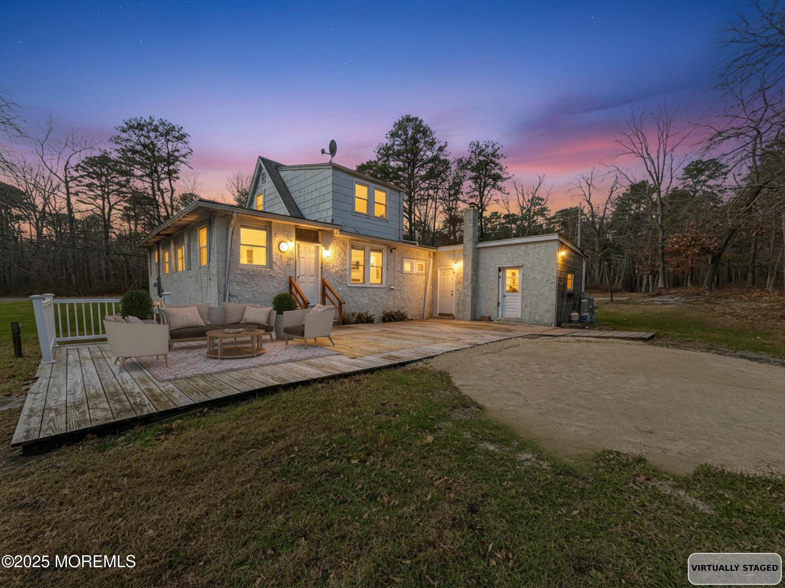5 Pittenger Pond Road Freehold, NJ 07728 - Photo 4 of 20 a view of a house with backyard and sitting area