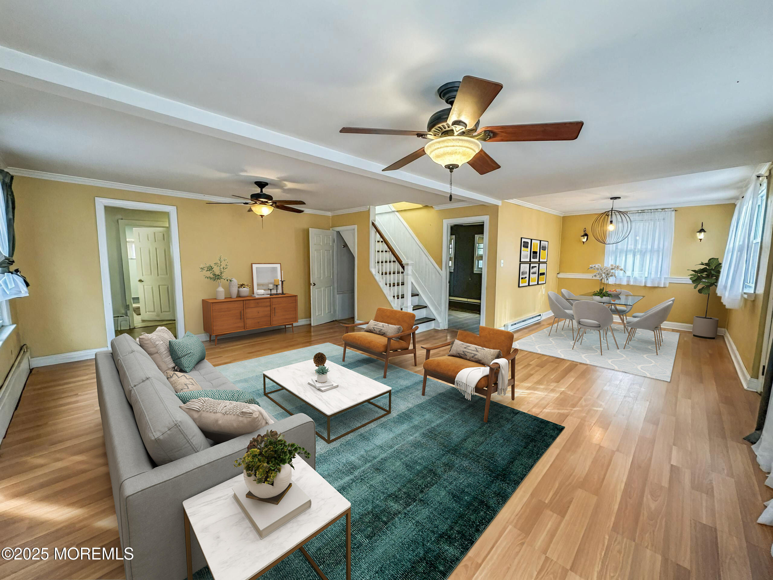5 Pittenger Pond Road Freehold, NJ 07728 - Photo 8 of 20 a living room with patio furniture and a wooden floor