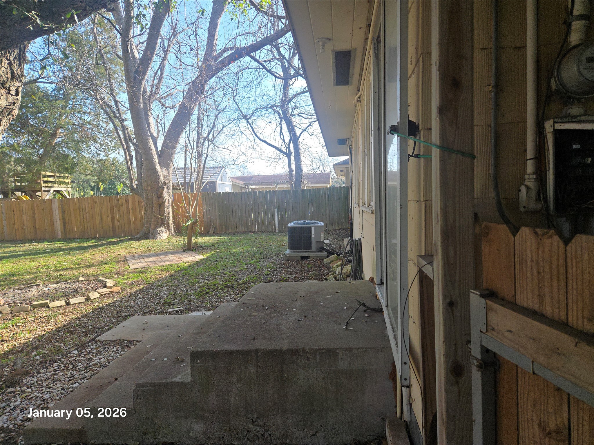 515 Breezy Lane Wharton, TX 77488 - Photo 3 of 18 a view of a house with backyard and trees