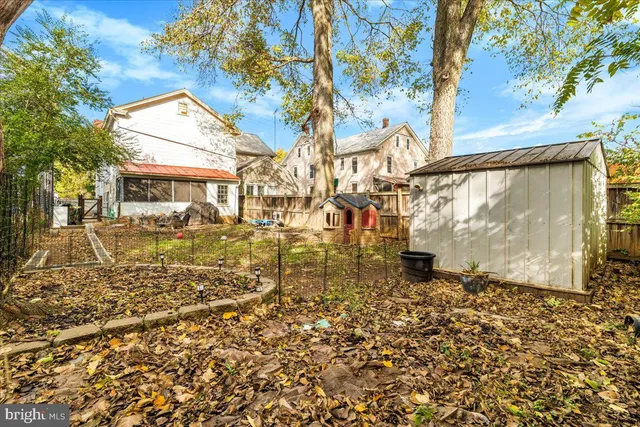 a view of a pathway with a yard