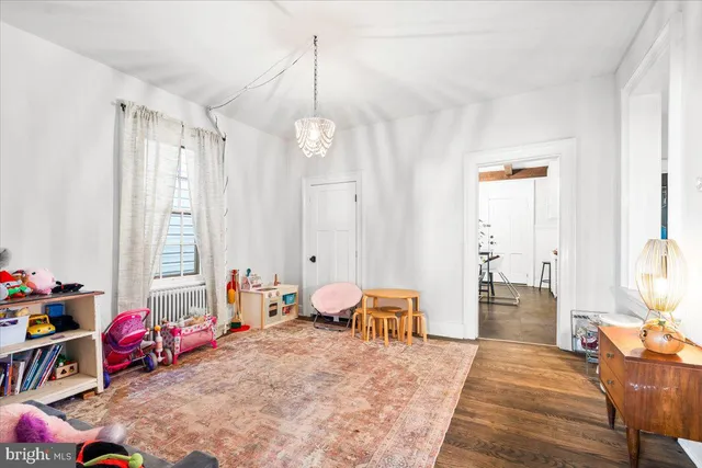 a bedroom with furniture and a bed