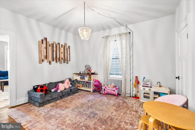 a view of a room with furniture and toys