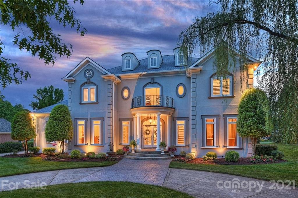 13710 Robert Walker Drive Davidson, NC 28036 - Photo 1 of 48 front view of a house with a yard