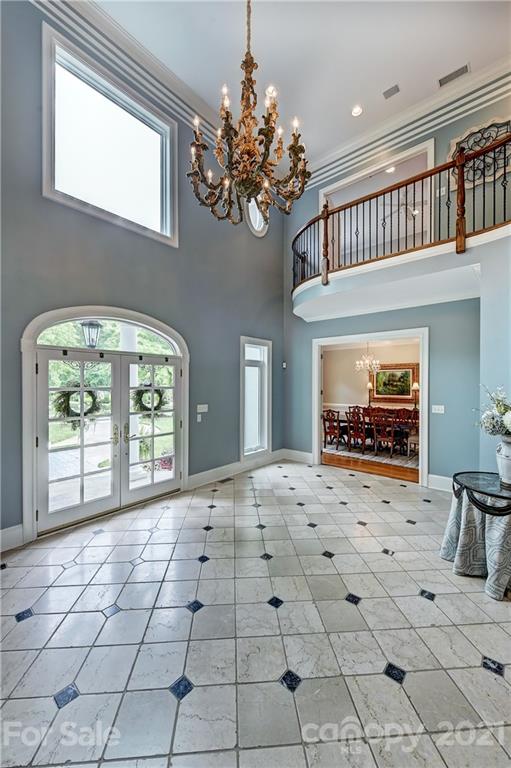13710 Robert Walker Drive Davidson, NC 28036 - Photo 11 of 48 a view of an entryway with a window