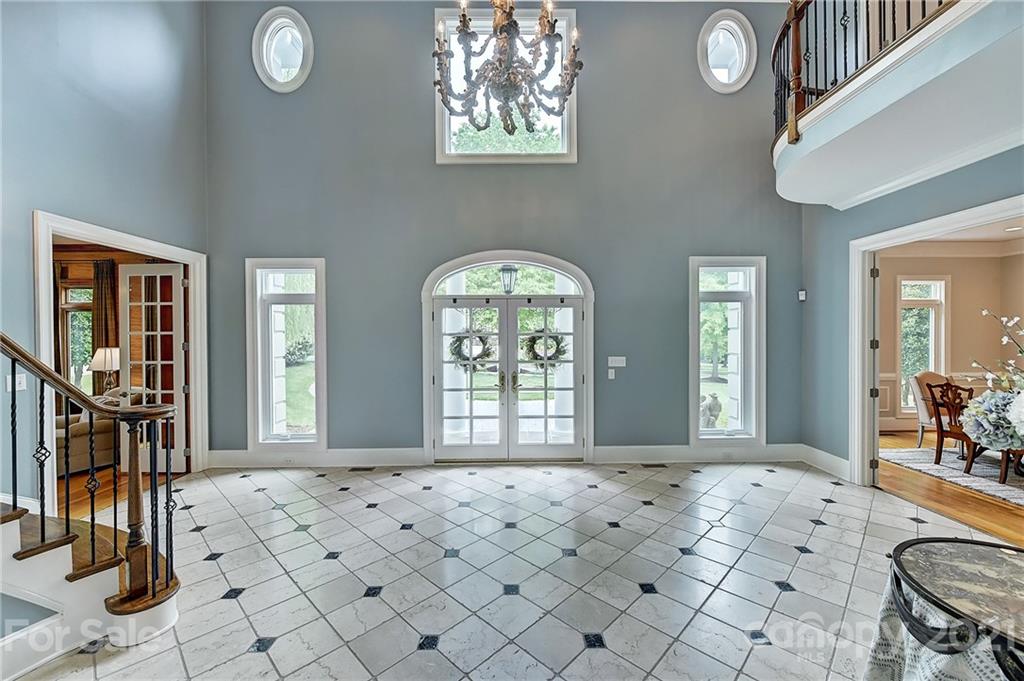 13710 Robert Walker Drive Davidson, NC 28036 - Photo 13 of 48 a view of a livingroom with windows